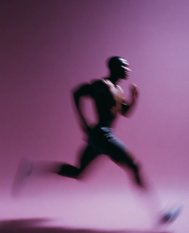 Runner in motion representing performance creative