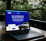 A website displayed on a laptop